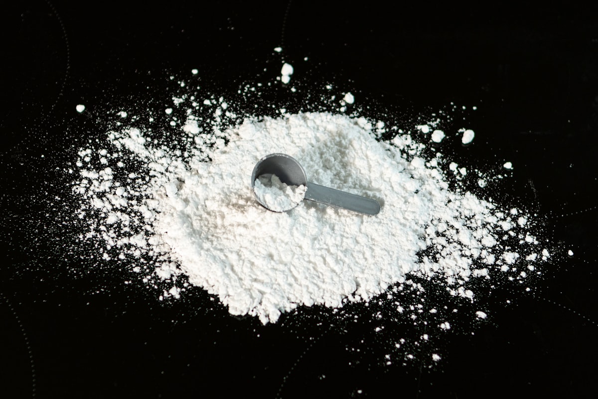 Protein supplement being mixed in a shaker bottle